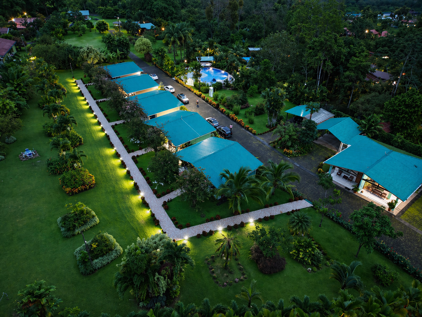Aerial view of Hotel Villas Vilma gardens, rooms, and pool